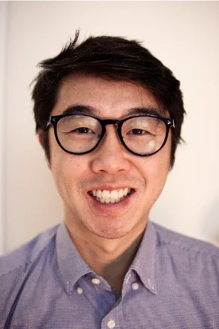 Mathew Chiang smiling — headshot